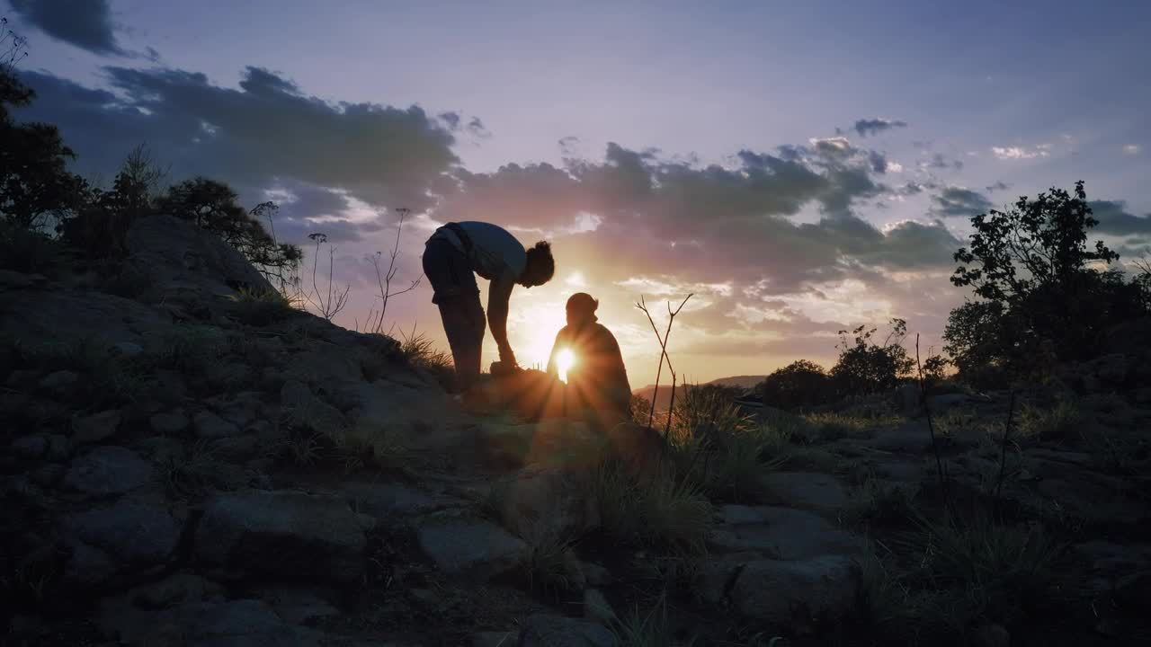 Free Stock Video Two Mountaineers Putting Away Their Things During The Sunset Live Wallpaper - Free Download