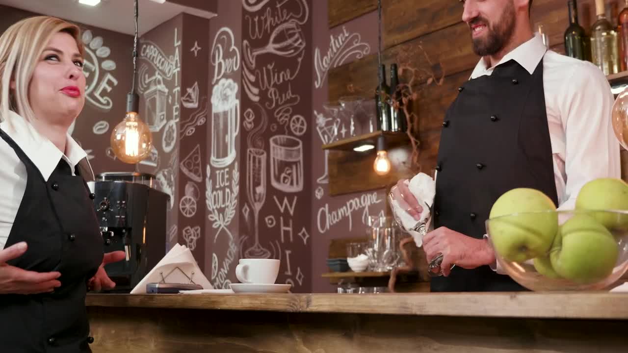 Stock Footage Waitress Talking To A Bartender Live Wallpaper - Free Download
