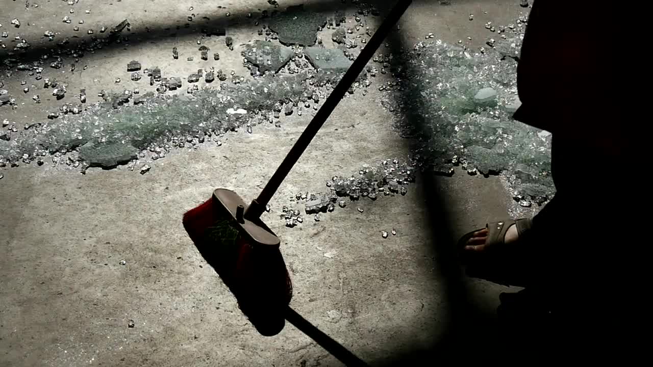 Video Stock Person Sweeping Many Broken Glass From The Floor Live Wallpaper Free - Free Download