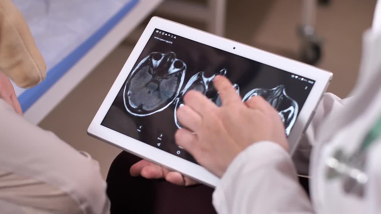 Stock Video Doctor Showing Scan Results On A Tablet Live Wallpaper For PC - Free Download