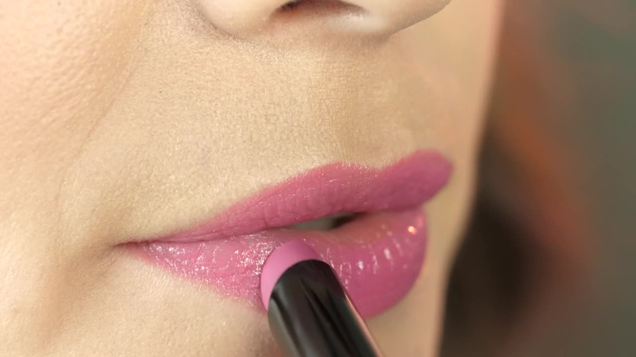 Stock Footage Woman Applying Pink Lipstick Live Wallpaper - Free Download