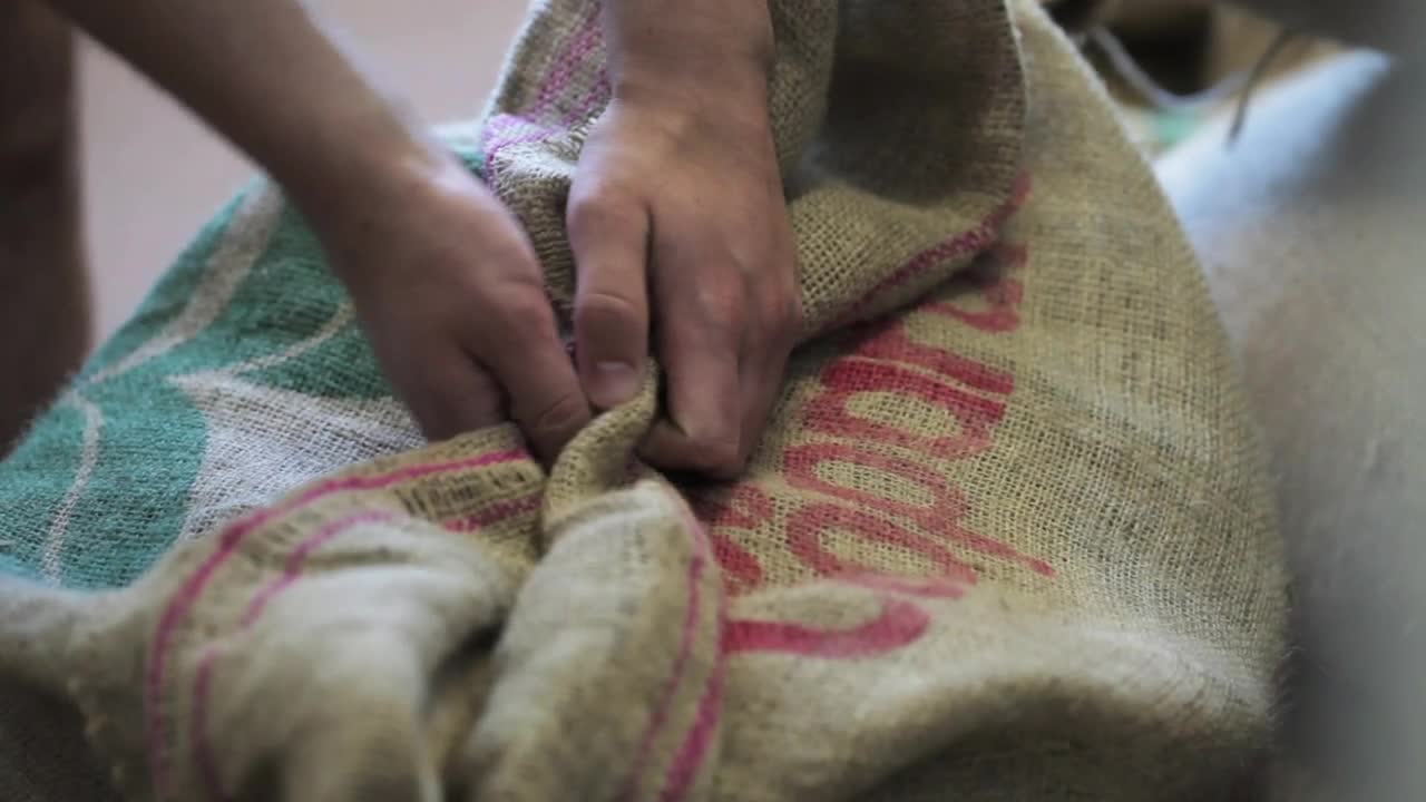Stock Video Opening A Sack Of Coffee Grain Live Wallpaper - Free Download