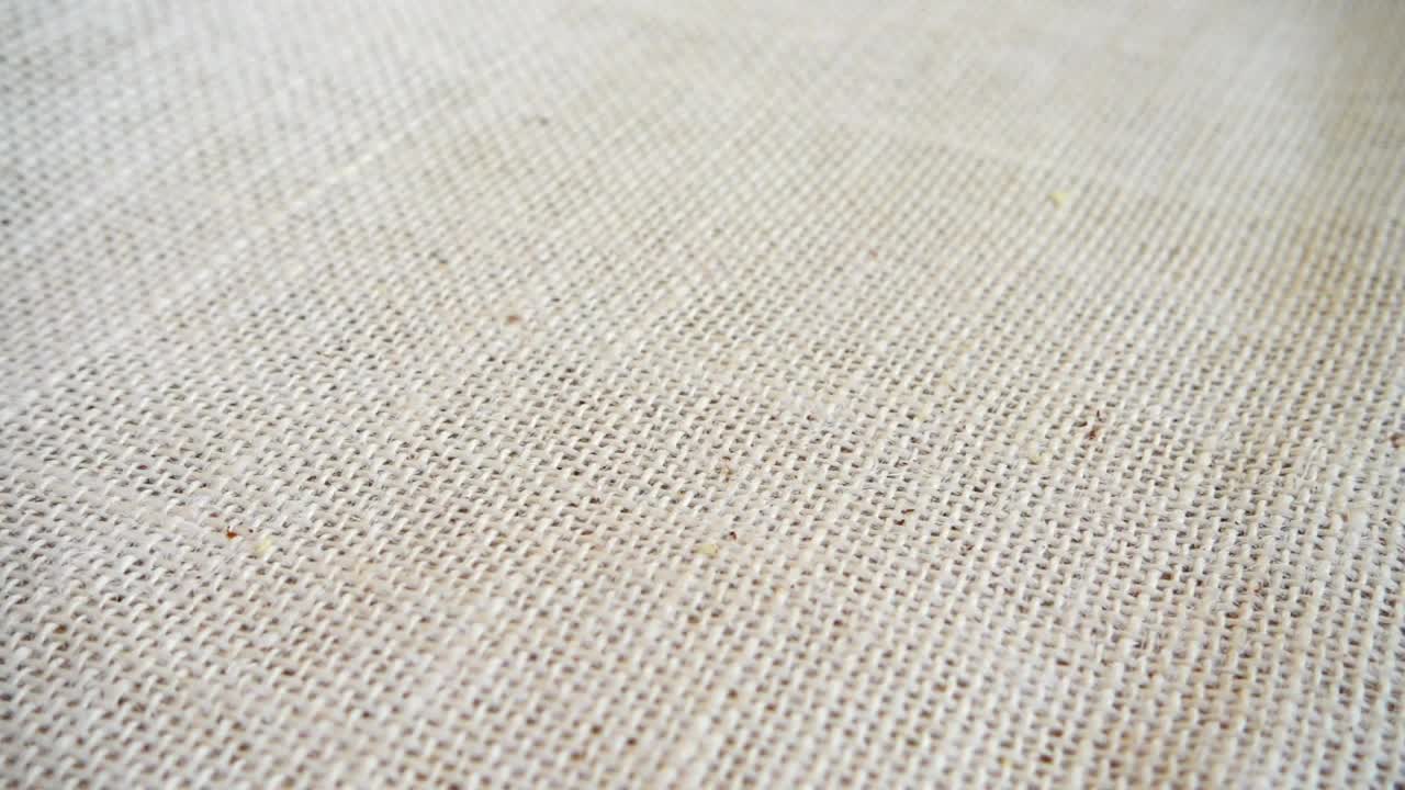 Free Video Stock texture of brazil nuts falling on a tablecloth Live Wallpaper - Free Download