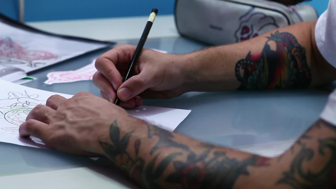 Free Video Stock Sketching A New Tattoo Design Live Wallpaper - Free Download