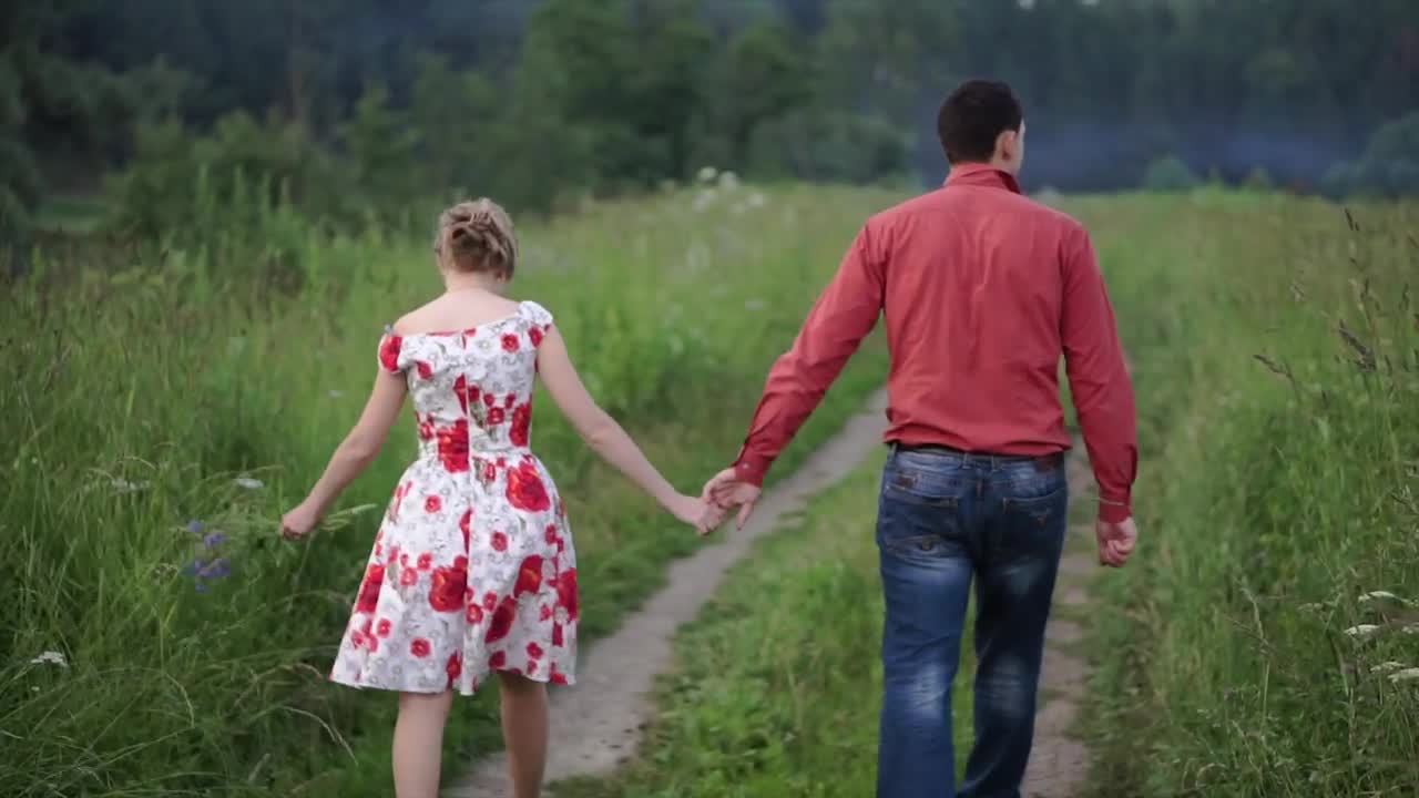 Stock Video Couple Holding Hands While Walking Outside Live Wallpaper For PC - Free Download