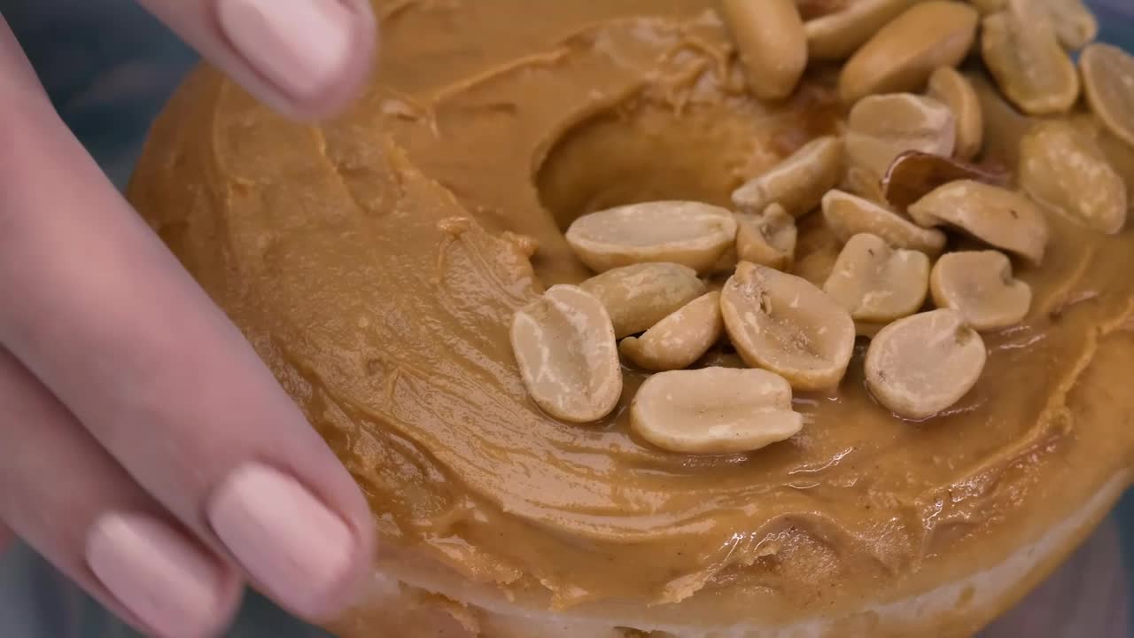 Free Video Stock taking a peanut butter donut from a plate Live Wallpaper - Free Download