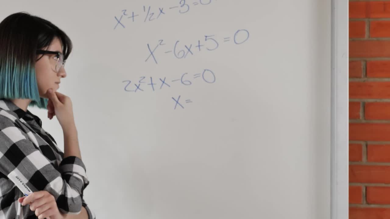 Free Video Stock Student Girl Trying To Solve Equations On The Whiteboard Live Wallpaper - Free Download