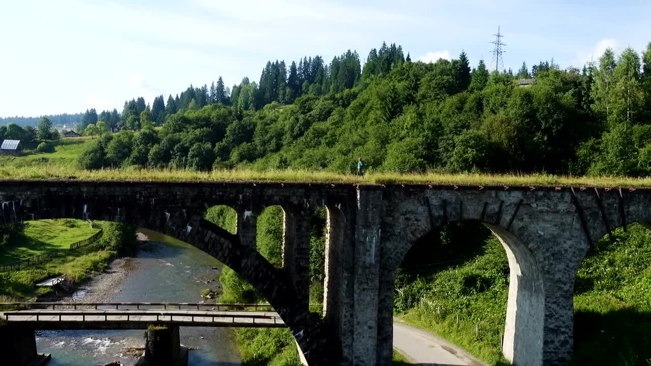 Stock Footage Walking Above An Ancient Stone Bridge Live Wallpaper - Free Download