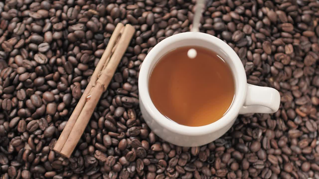 Stock Video Milk Being Poured Into A Coffee Cu Animated Wallpaper - Free Download