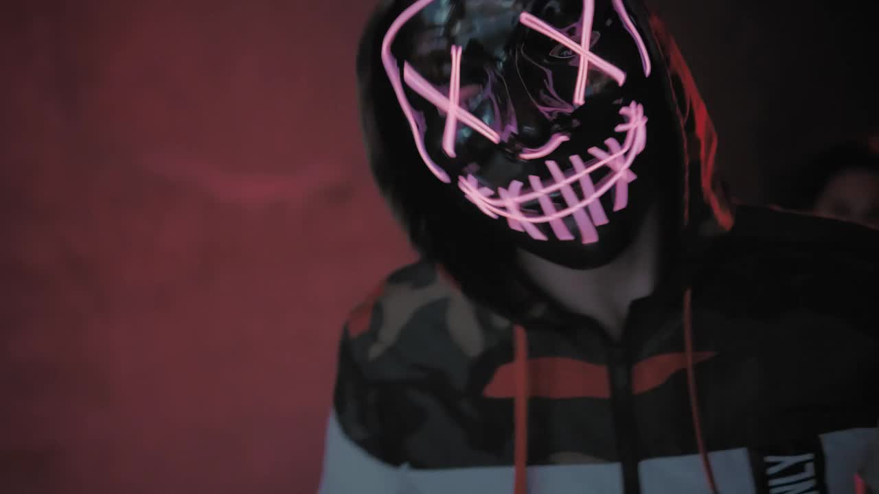 Video Stock Popping Dancer Wearing A Mask With Neon Lights Live Wallpaper Free - Free Download