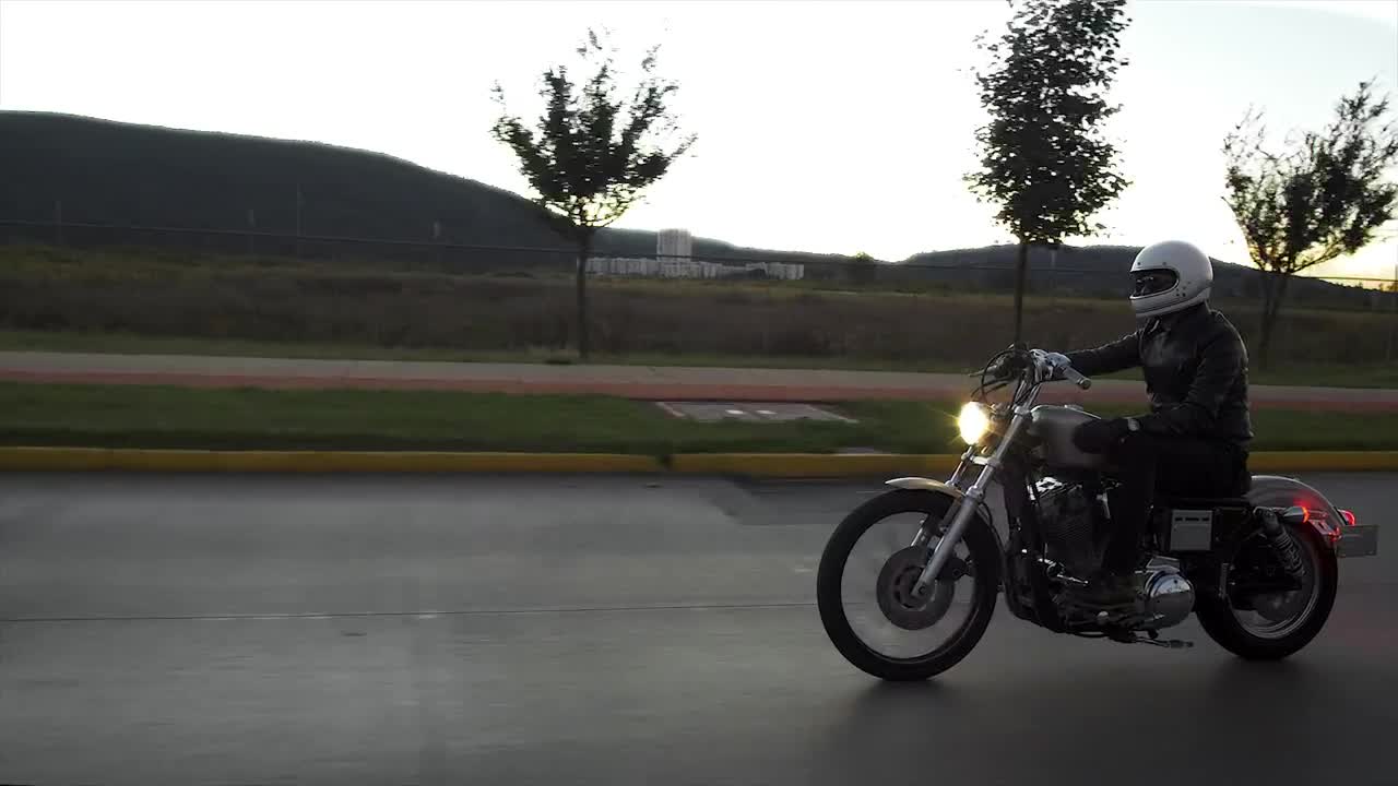 Stock Video Person Driving A Motorcycle In The Street Live Wallpaper - Free Download