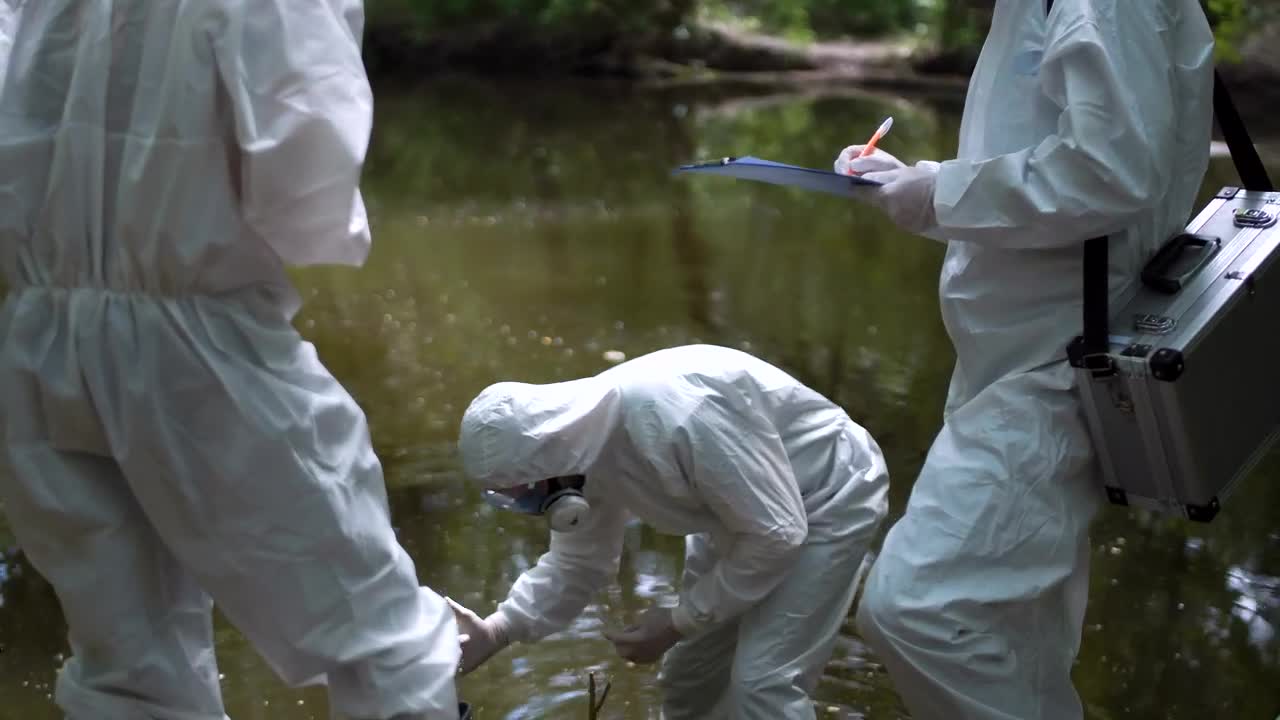 Free Stock Video Scientist In Biohazard Suits Collecting Water Live Wallpaper - Free Download