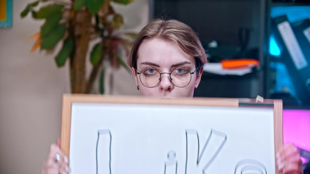 Free Stock Video Woman Showing A Sign That Says Like Live Wallpaper - Free Download