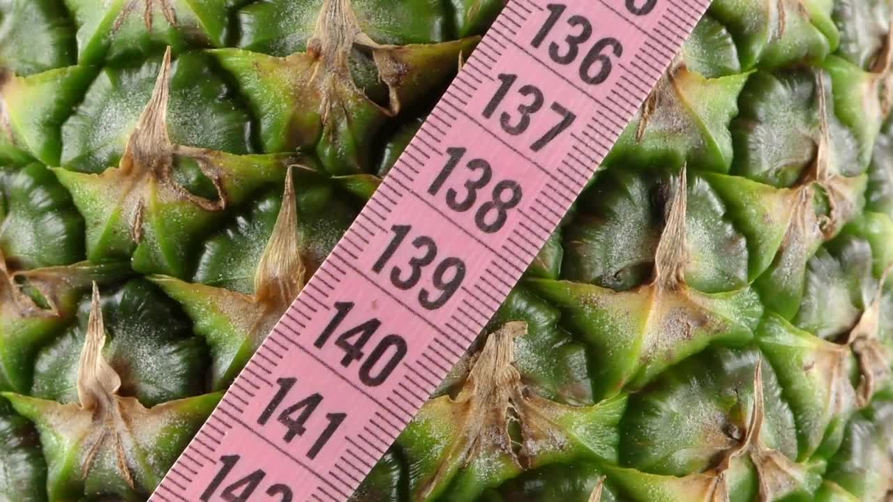 Free Video Stock texture of a green pineapple and a measuring tape Live Wallpaper - Free Download