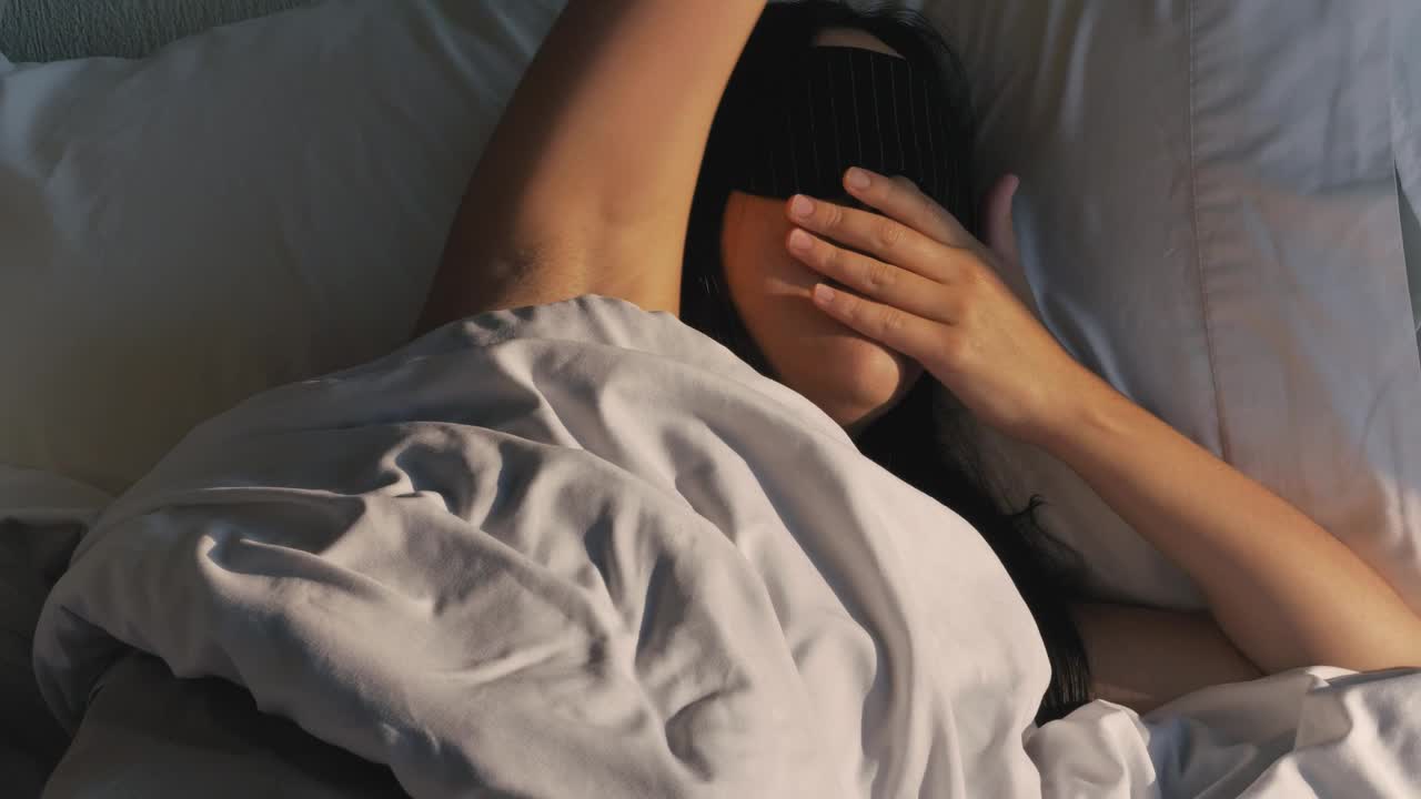 Free Stock Video Woman Waking Up Peacefully Taking Off Her Mask Live Wallpaper - Free Download