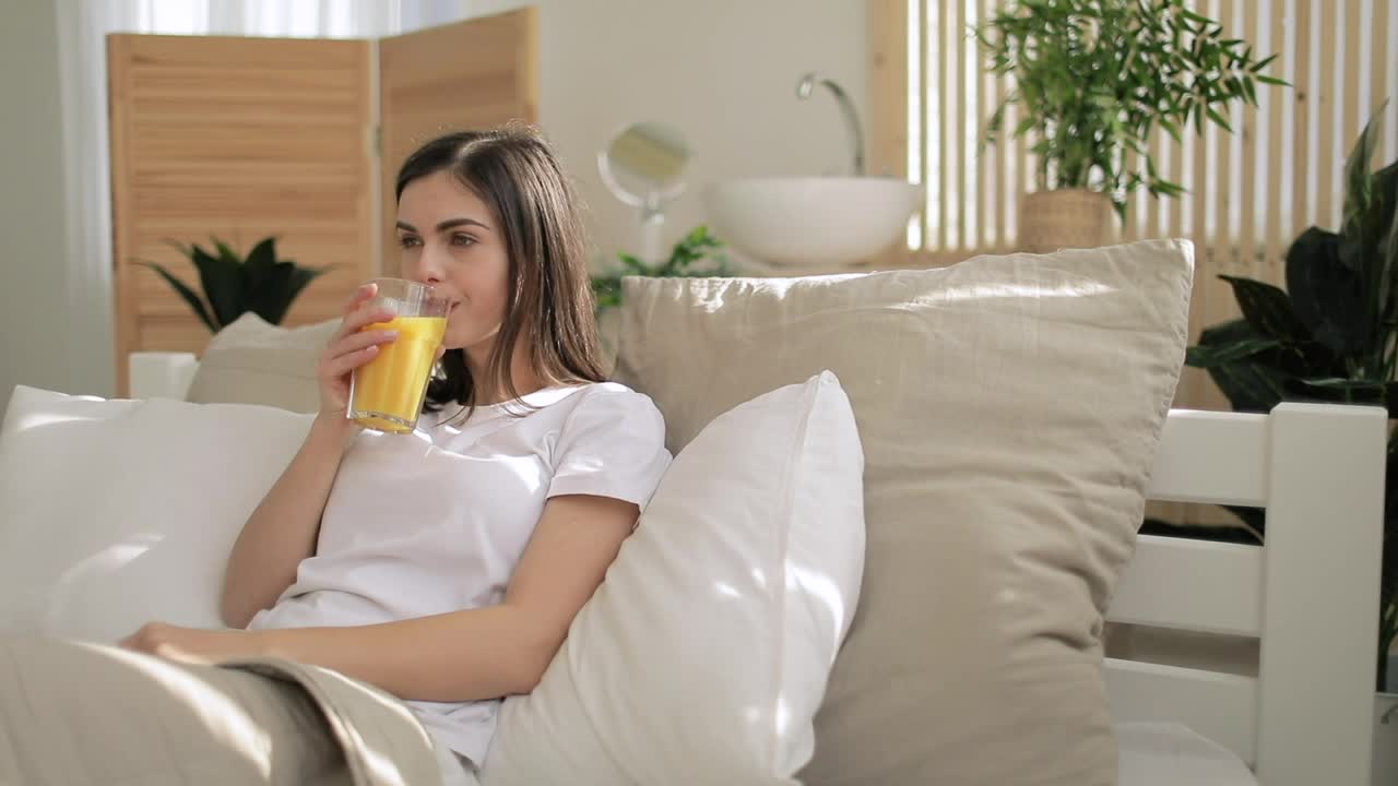 Free Video Stock Smiling Woman Drinking Orange Juice Live Wallpaper - Free Download