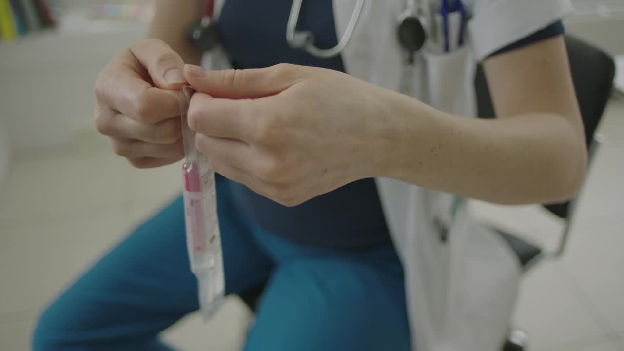 Stock Video Doctor Opening A Swab Live Wallpaper For PC - Free Download