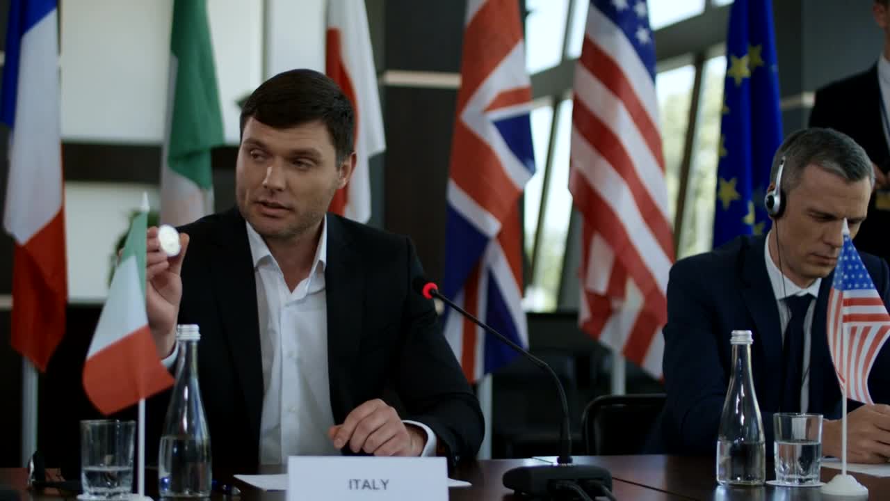 Stock Video Italian Politic Man Showing Bitcoin In Conference Animated Wallpaper - Free Download