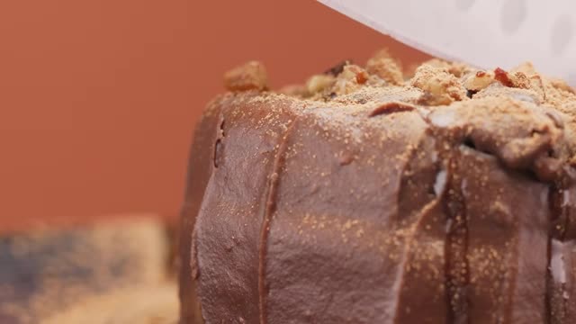 Stock Video Large Knife Splitting A Small Chocolate Cake Smal Animated Wallpaper - Free Download