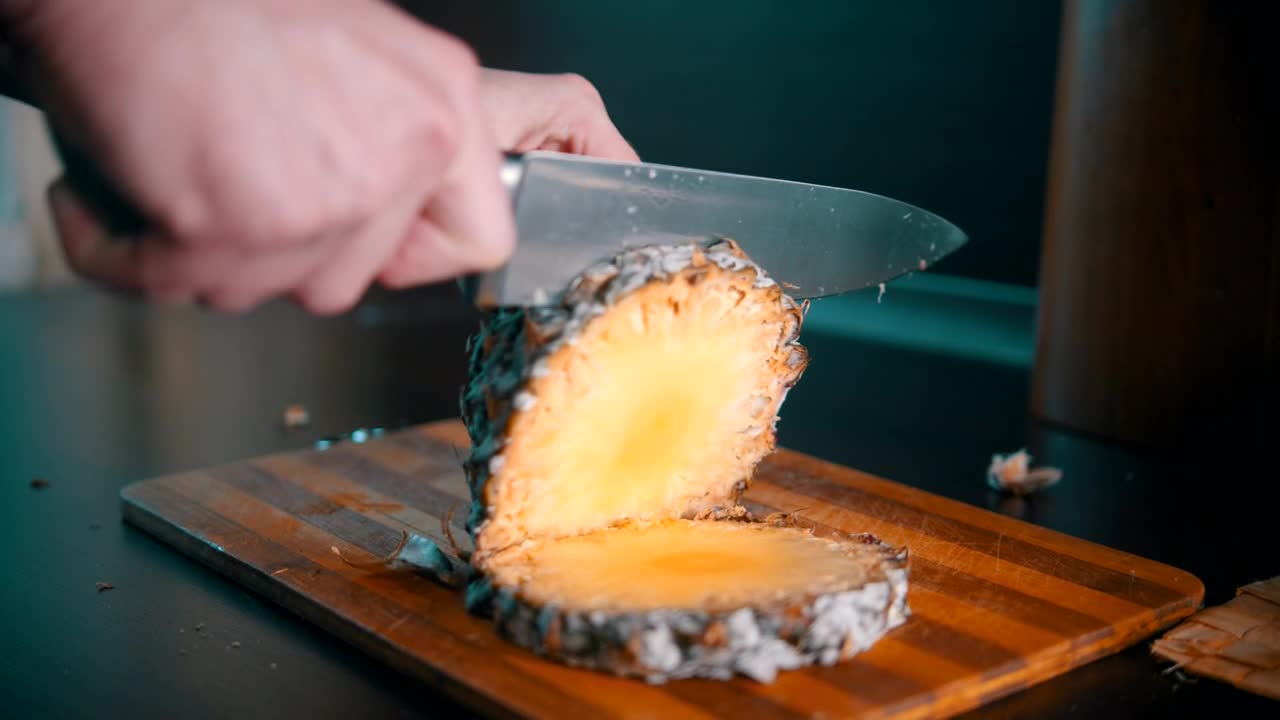 Stock Video Cutting A Pineapple In Pieces With A Knife Live Wallpaper For PC - Free Download