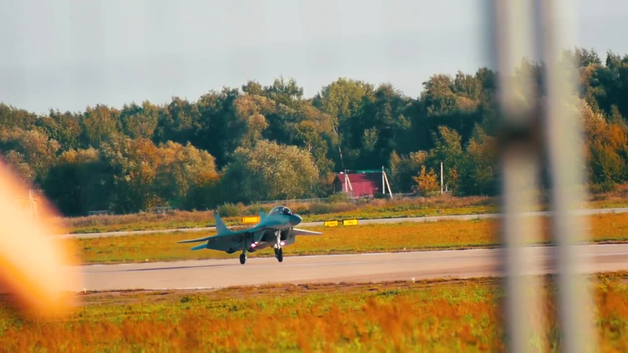 Stock Video Jet Moving In The Distance Down A Runway Animated Wallpaper - Free Download