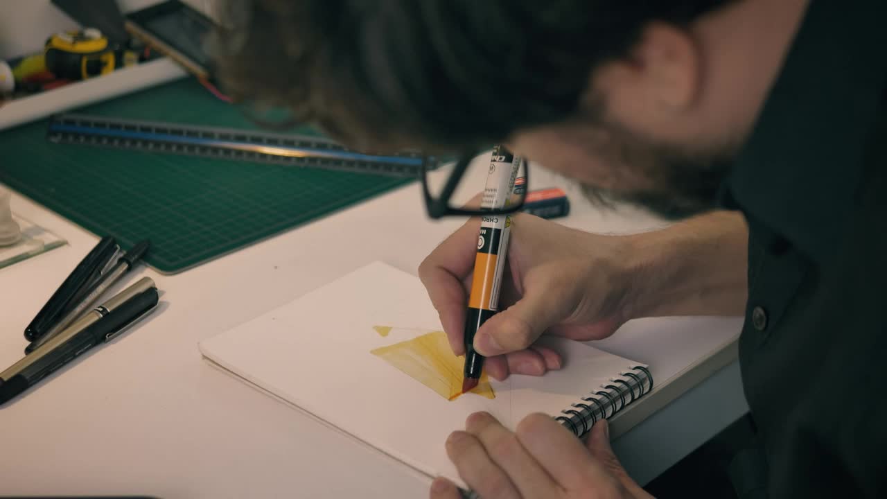 Stock Video Designer In His Studio Giving Color To His Strokes In Live Wallpaper For PC - Free Download