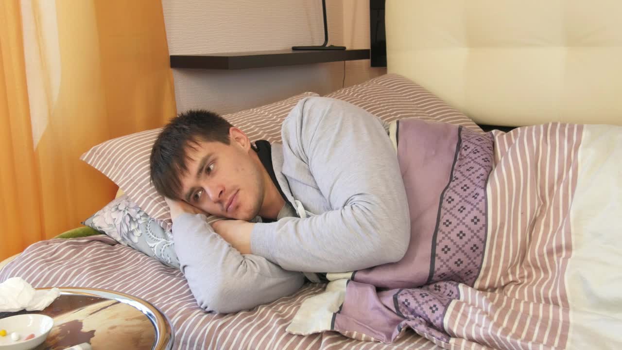 Free Stock Video Sick Man Laying In Bed During The Day Live Wallpaper - Free Download