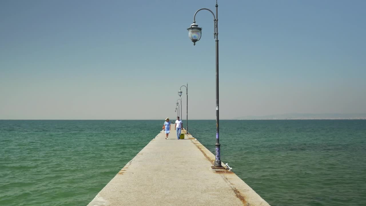 Stock Footage Walking Along A Concrete Pier Live Wallpaper - Free Download