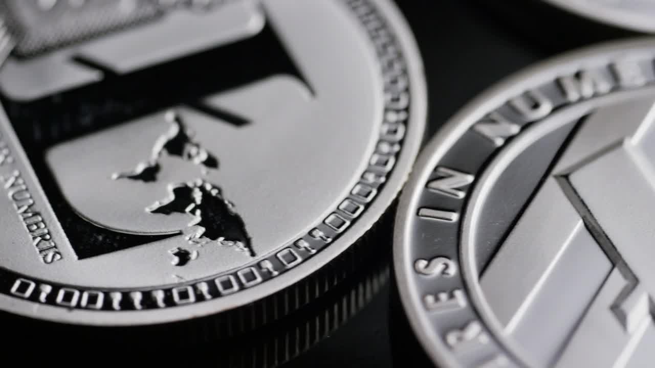Stock Video Macro Shot Of Lite Cryptocurrency Coins Animated Wallpaper - Free Download