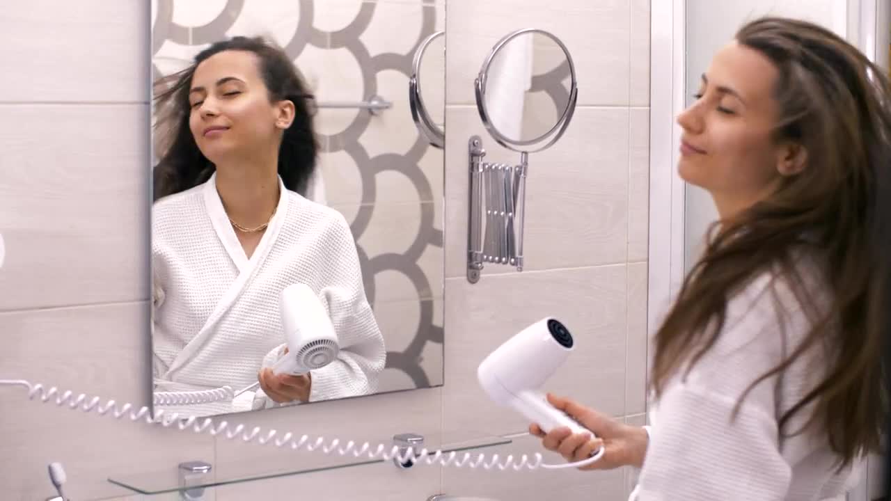 Free Stock Video Woman In Robe Singing Happily In Front Of The Mirror Live Wallpaper - Free Download