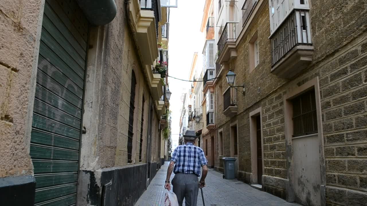 Stock Video Old Man Walking With A Bag Live Wallpaper - Free Download