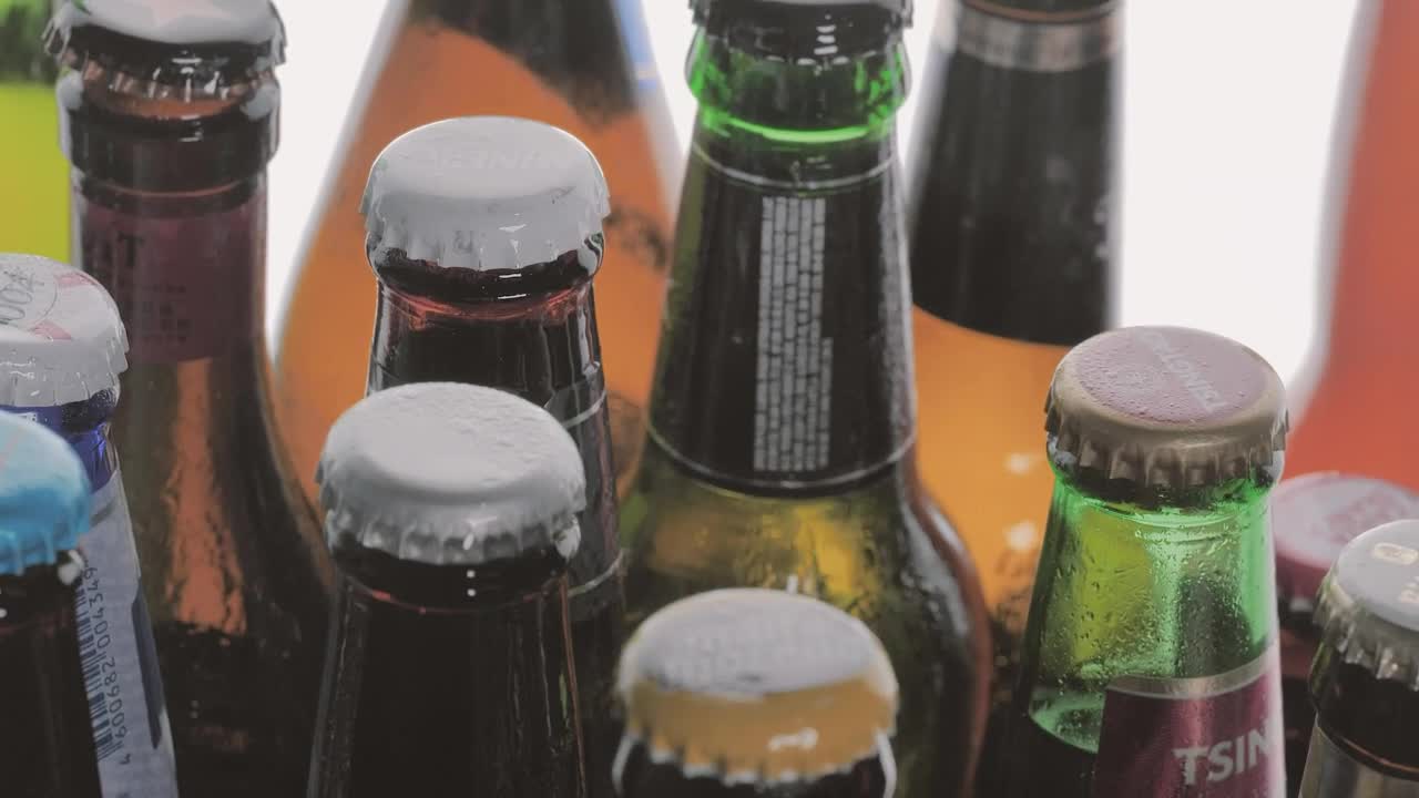 Video Stock Closed Beer Glass Bottles On A White Background Live Wallpaper For PC - Free Download