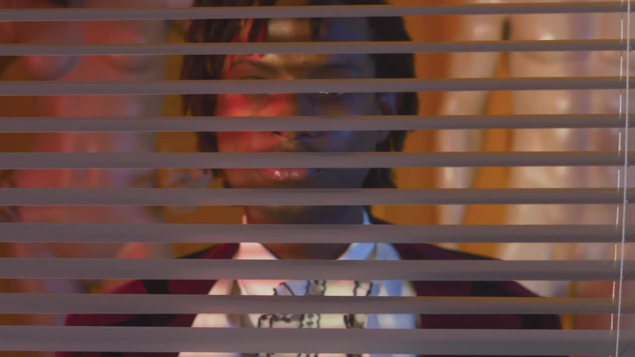 Free Video Stock Stylish Lgbtq Man Looking Through A Blind Live Wallpaper - Free Download