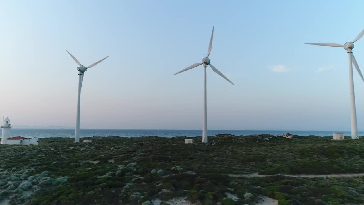 Stock Footage Wind Turbines Next To A Lighthouse Live Wallpaper - Free Download