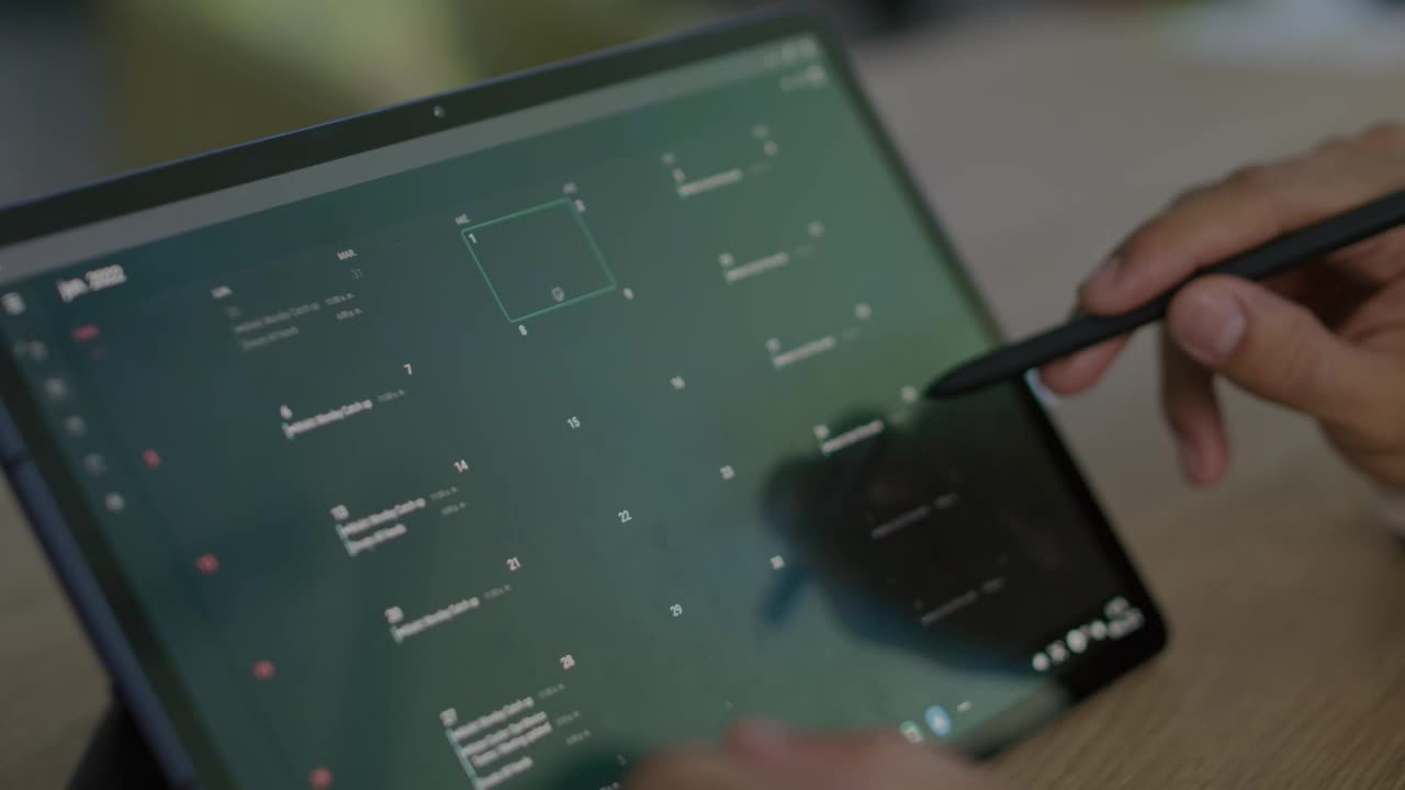Video Stock Checking The Calendar On A Tablet Live Wallpaper For PC - Free Download