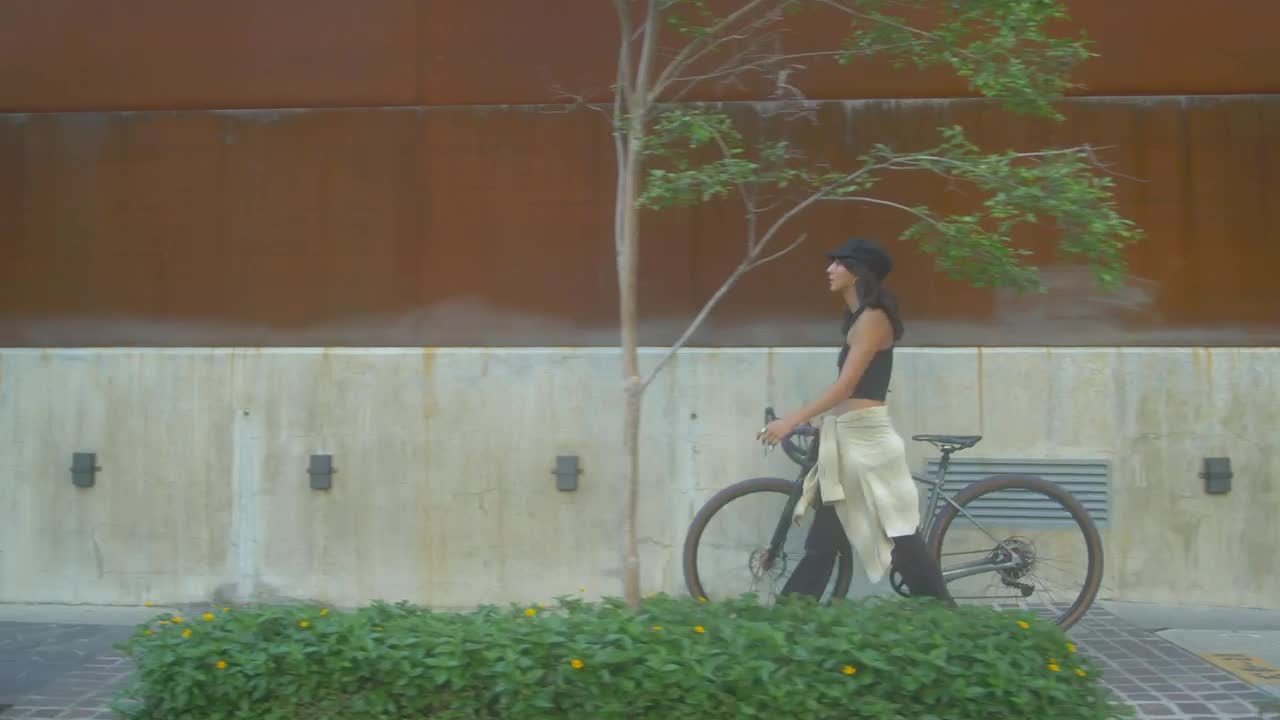 Stock Video Girl Walking With A Bicycle On The Sidewalk Live Wallpaper For PC - Free Download