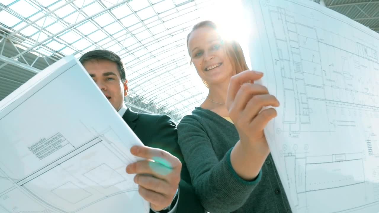 Stock Video Engineers Looking At Blueprints Live Wallpaper For PC - Free Download