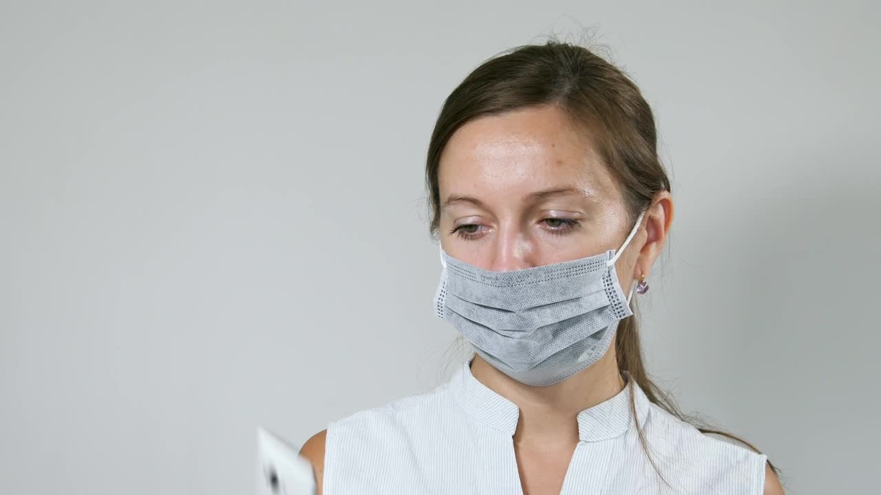 Free Stock Video Woman Sanitizing Her Mobile Phone Live Wallpaper - Free Download