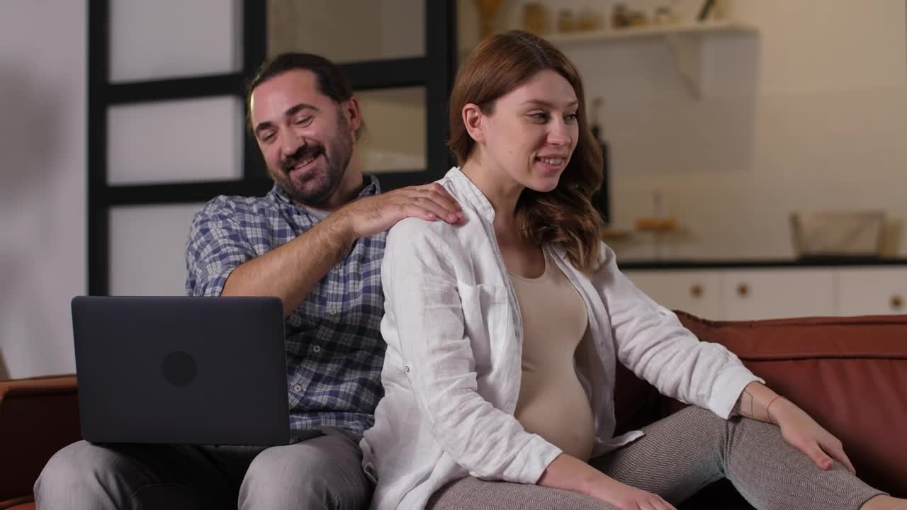 Stock Video Man Giving A Massage To His Pregnant Wife Animated Wallpaper - Free Download