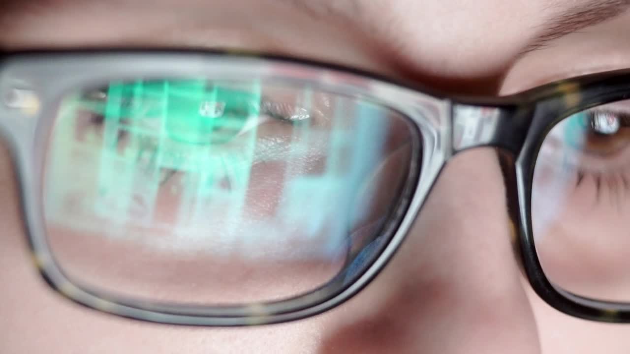 Video Stock Closeup Of Surfing Internet Reflected In Glasses Live Wallpaper For PC - Free Download