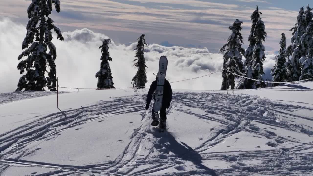Free Video Stock Skier At The Peak Of A Snowy Mountain Live Wallpaper - Free Download