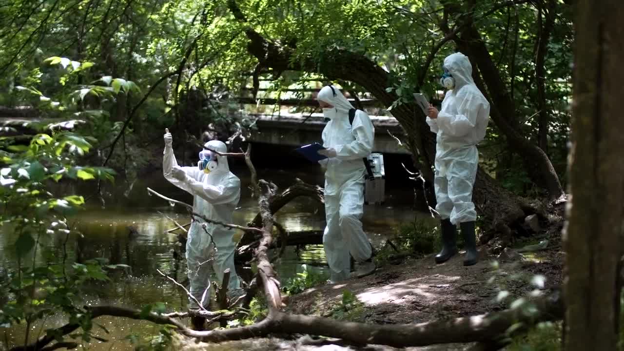 Free Stock Video Scientist In Biohazard Suits Collecting Samples Live Wallpaper - Free Download