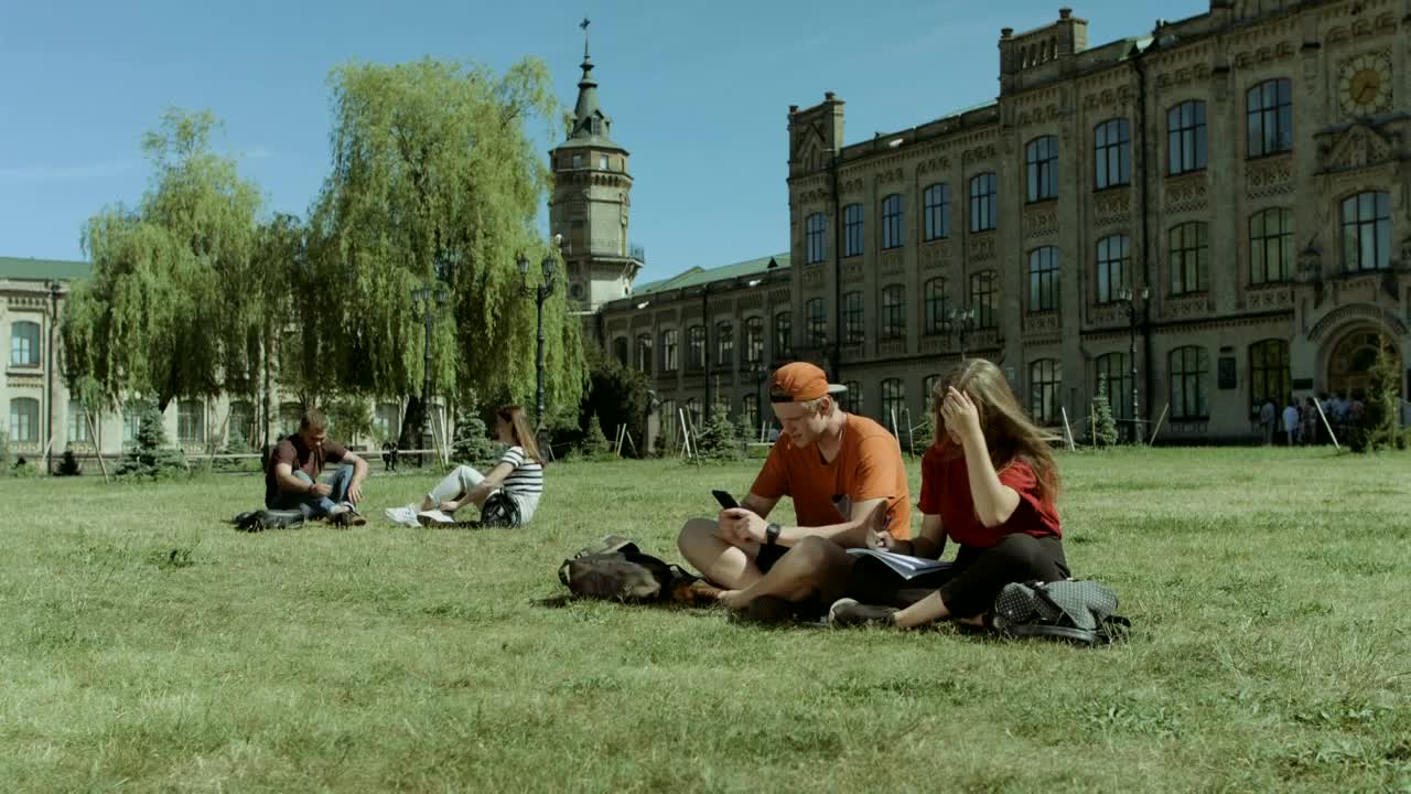 Free Video Stock Students Resting In A University Garden Live Wallpaper - Free Download