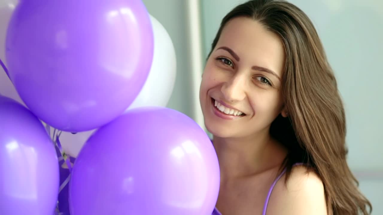 Stock Video Happy Woman With Purple And White Balloons Portrait Animated Wallpaper - Free Download