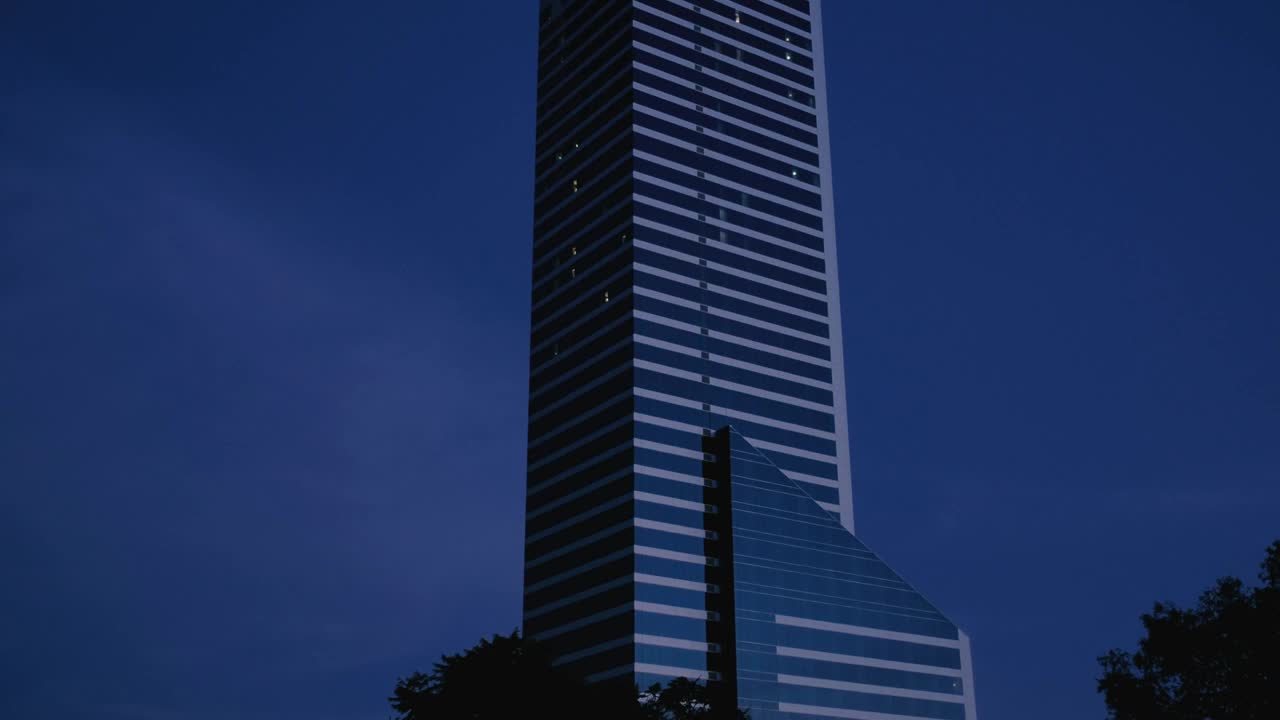Free Video Stock Skyscrapers During Darkness Falls At Night Live Wallpaper - Free Download