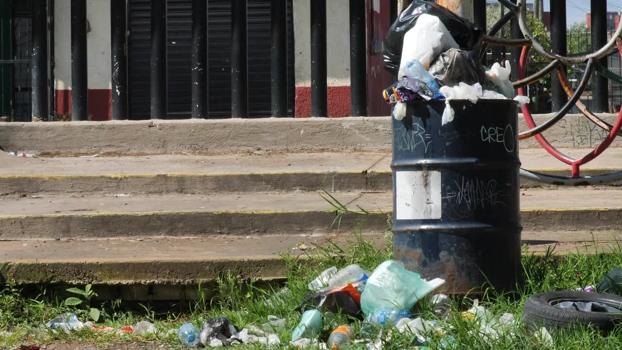 Stock Video Old Rusty Can Full Of Garbage On The Street Live Wallpaper - Free Download