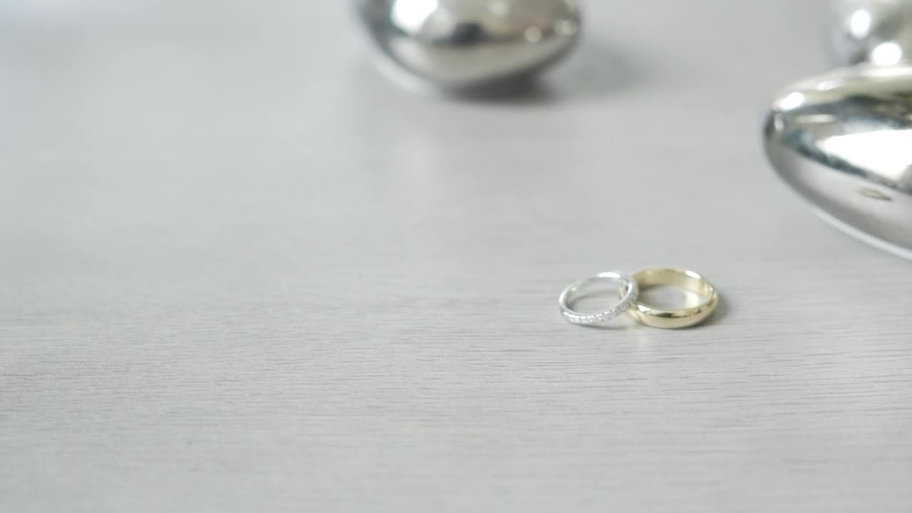Stock Video Engagement Rings On A Wedding Table Live Wallpaper For PC - Free Download