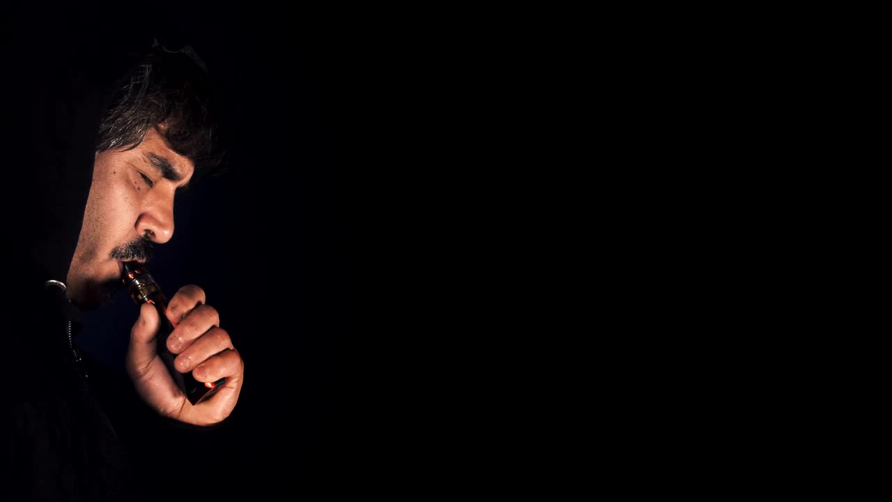 Video Stock Person Smoking An Electronic Cigarette In The Dark Live Wallpaper Free - Free Download