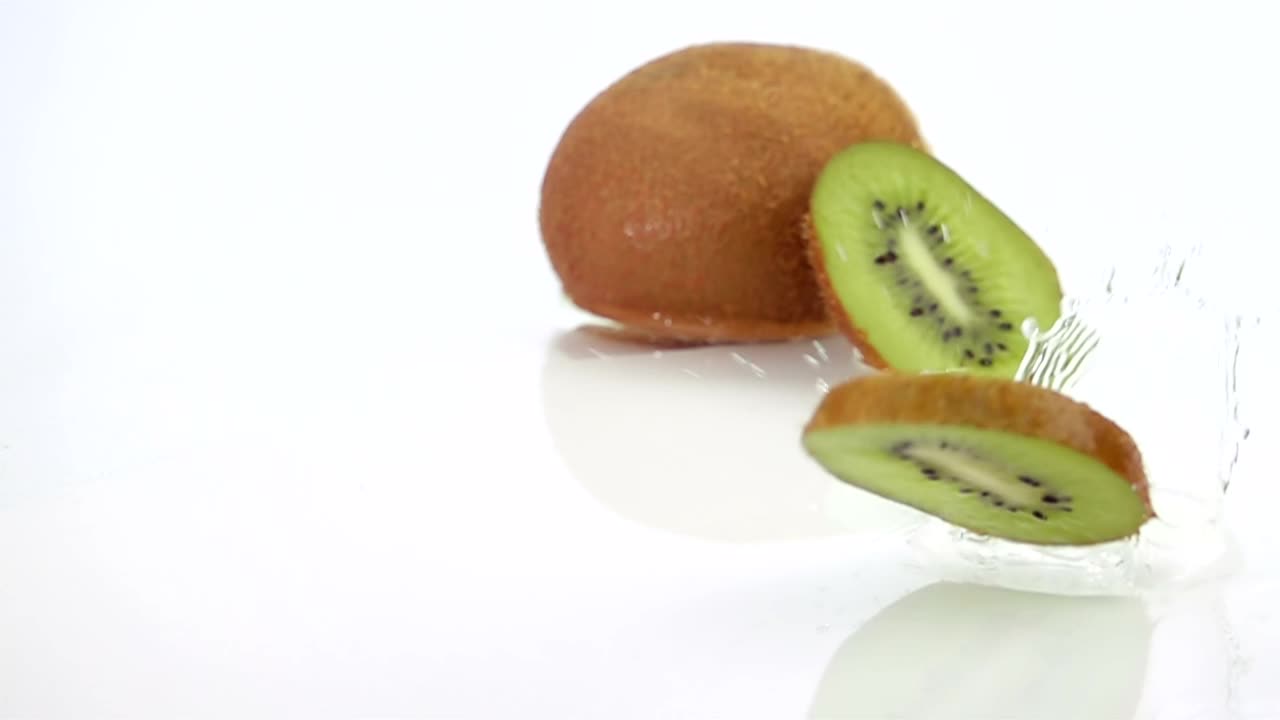 Free Video Stock Slices Of Kiwi Falling Over Water Live Wallpaper - Free Download