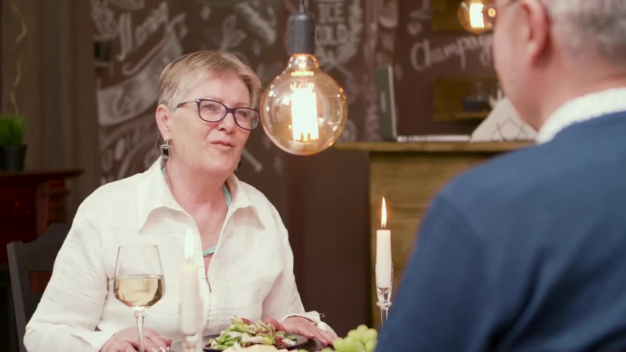 Free Stock Video Senior Woman Chats Over Romantic Dinner In Modern Restaurant Live Wallpaper - Free Download